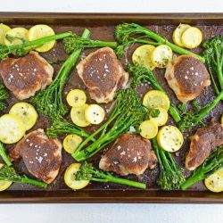 coverhead of sheet pan chicken thighs in the oven