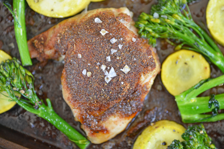 chicken thighs on a sheet pan with veggies 