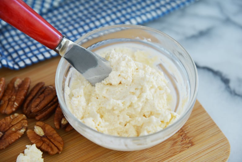 gouda and sour cream spread in a small glass bowl 