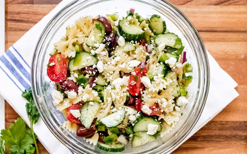 overhead greek pasta salad in a bowl