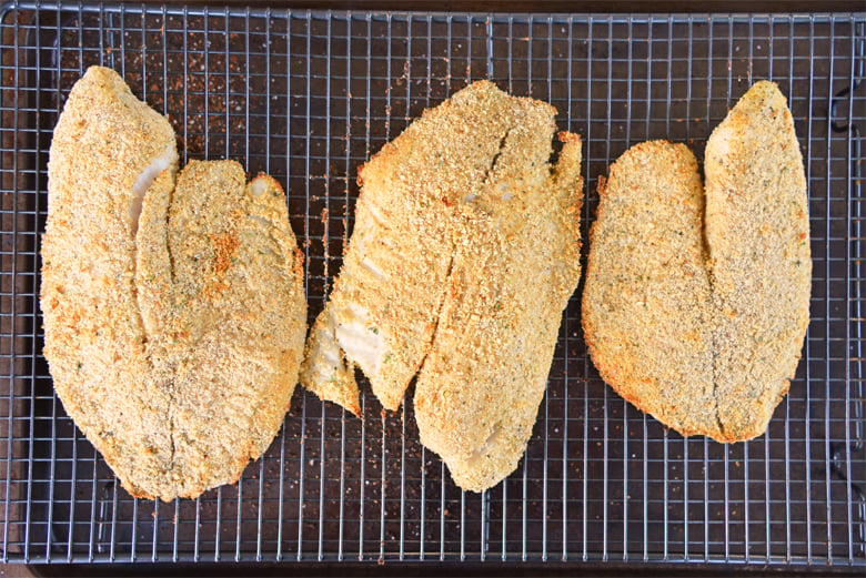 cooked tilapia fillets with parmesan breading 