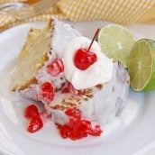 angled shot of slice of 7 up pound cake on plate
