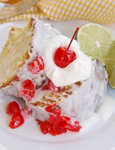 angled shot of slice of 7 up pound cake on plate