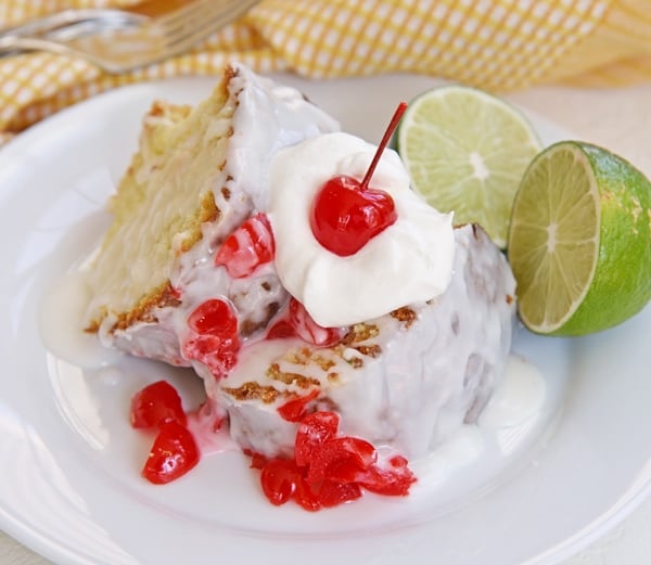 angled shot of slice of 7 up pound cake on plate
