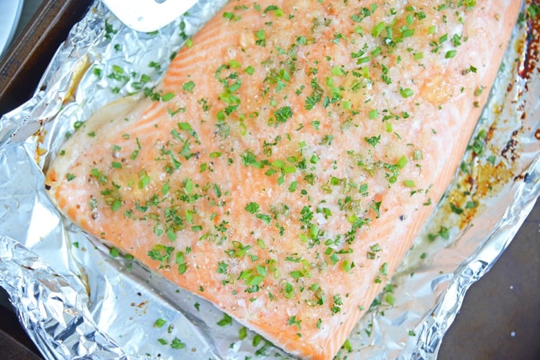 apple glazed salmon on a baking sheet 