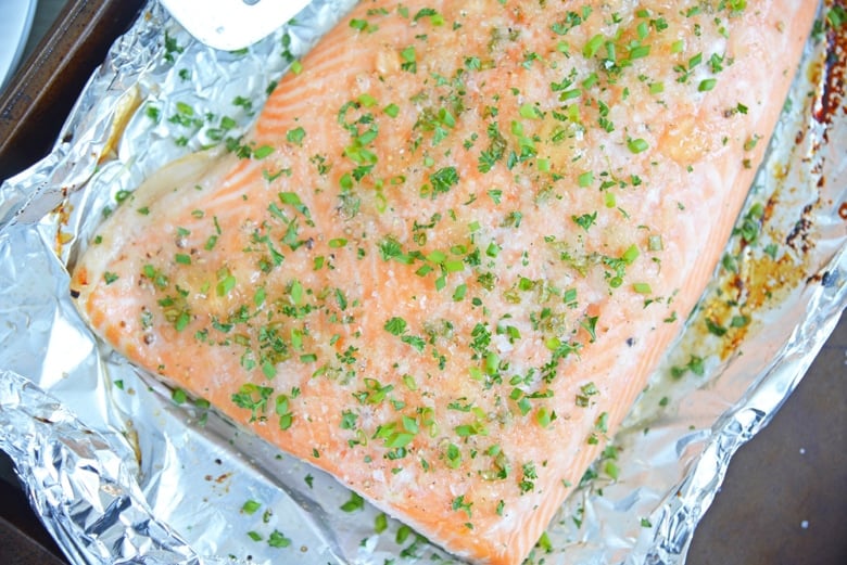 apple glazed salmon on a baking sheet 