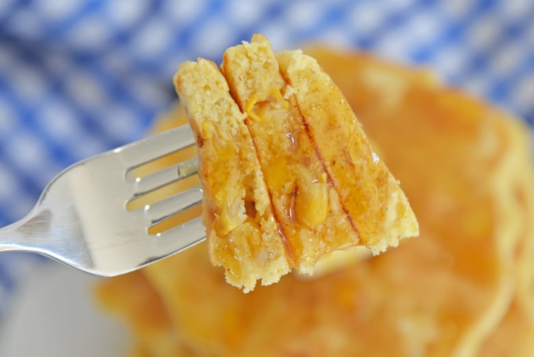 fork with bite of corn cakes 