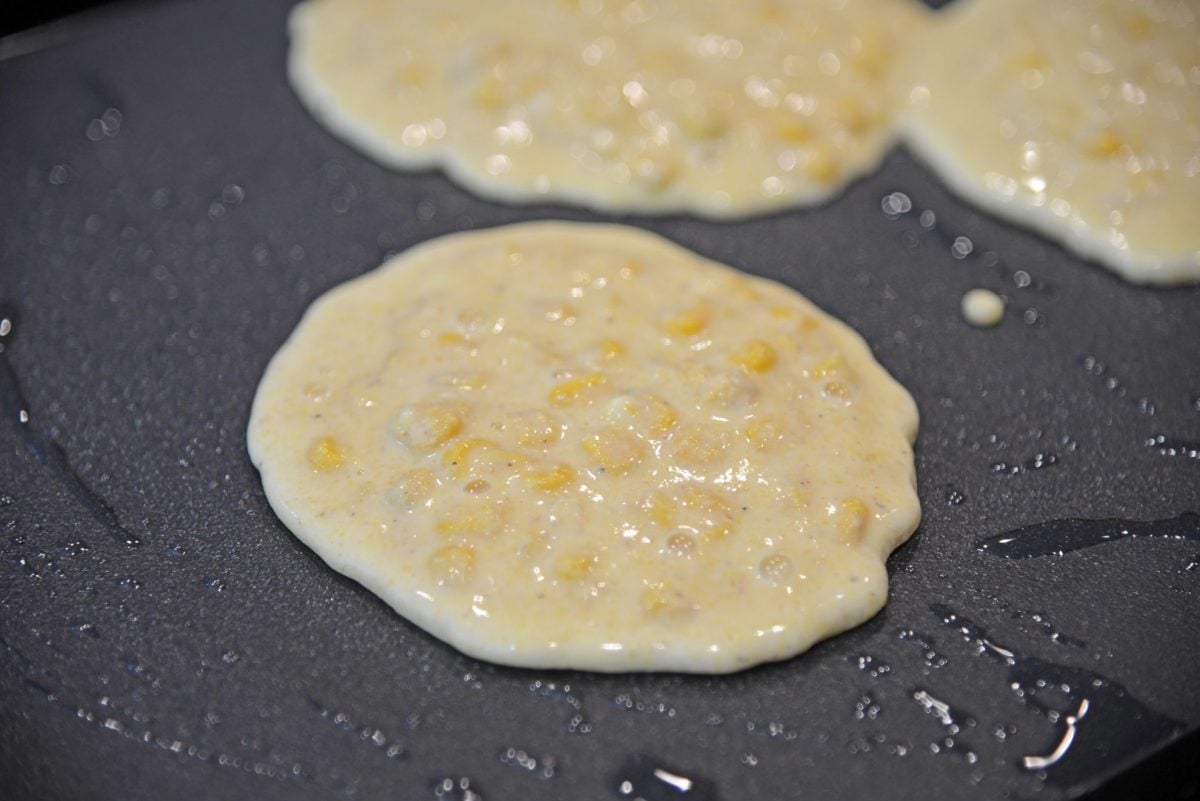 corn pancake on a griddle 