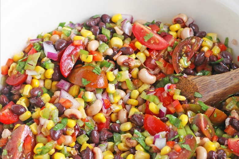 close up of texas caviar with a wood spoon 