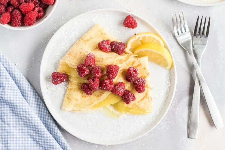 crepes filled with lemon curd and fresh raspberries 