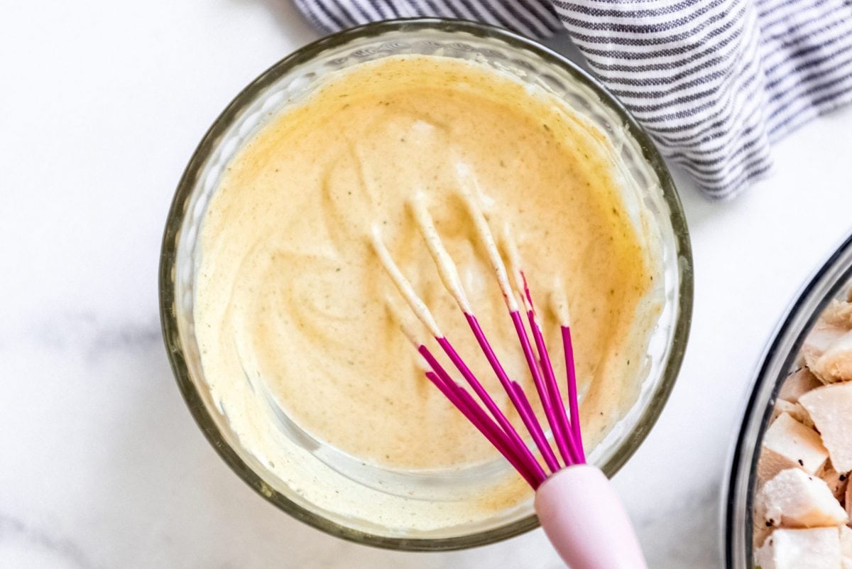 curry sauce with a whisk 