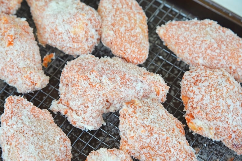 close up of breaded chicken wings 