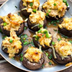 lobster stuffed mushrooms on a plate