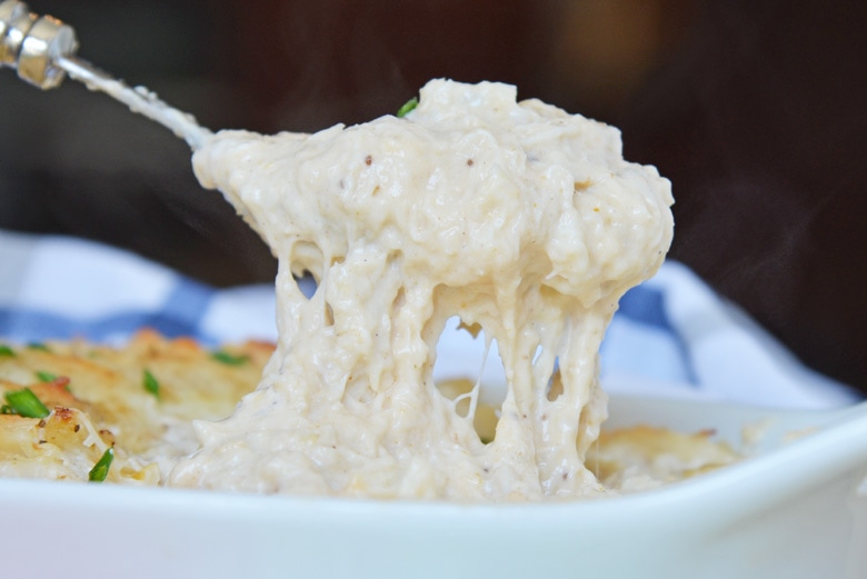 spoon with cheesy crab dip 