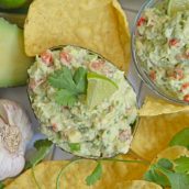 close up of roast garlic guacamole