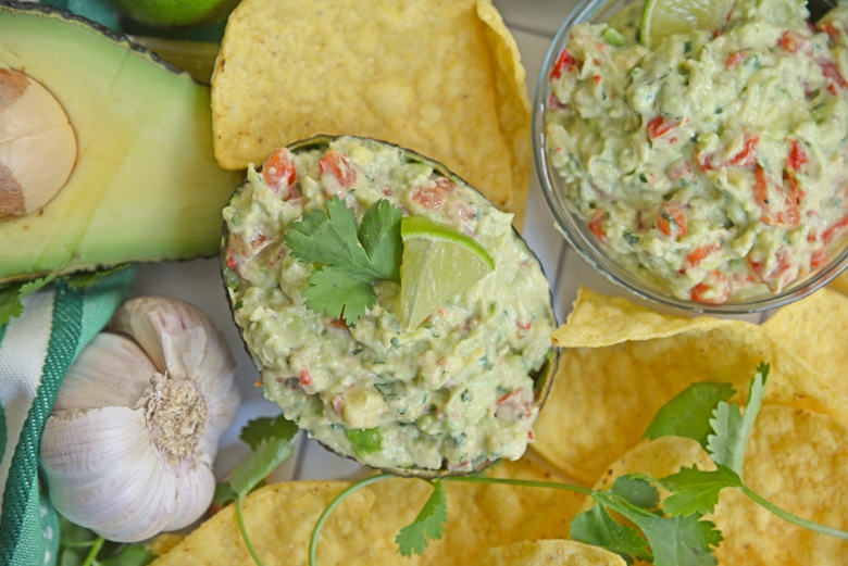 close up of roast garlic guacamole