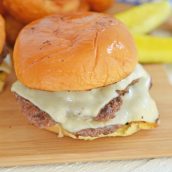 smash burger on a wood board