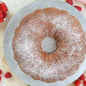overhead of sour cream pound cake with powdered sugar dusting
