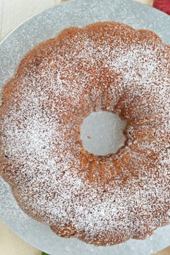 overhead of sour cream pound cake with powdered sugar dusting