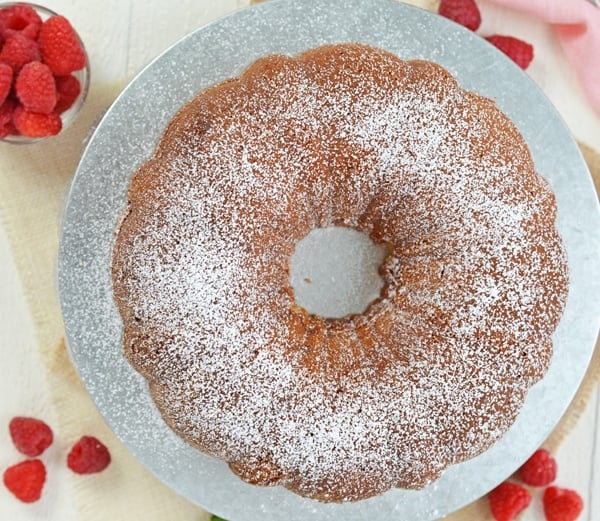 overhead of sour cream pound cake with powdered sugar dusting