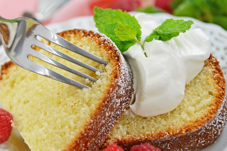 fork digging into pound cake slice