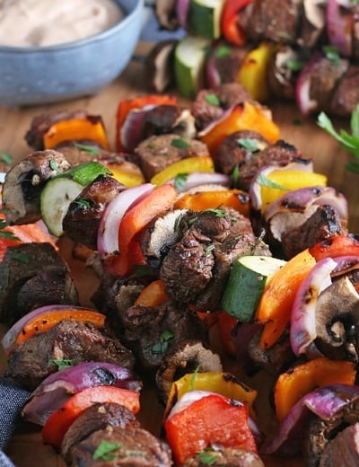 steak kabobs on a cutting board