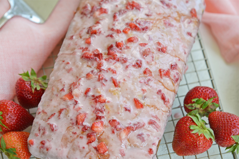 A close up of strawberry loaf pound cake 