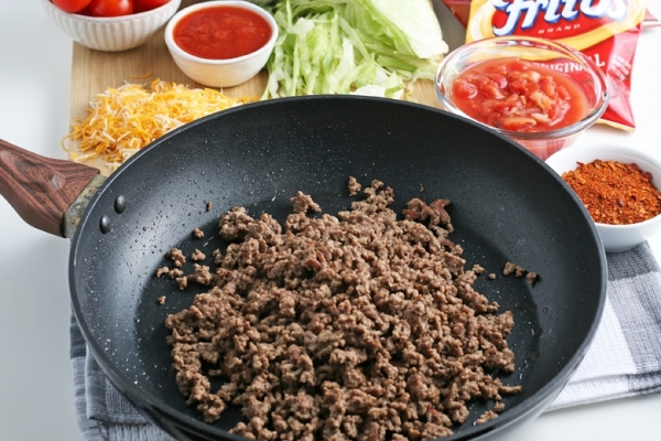 ground beef cooking in a skillet