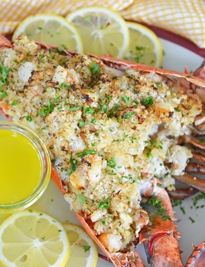whole stuffed lobster with butter and lemons