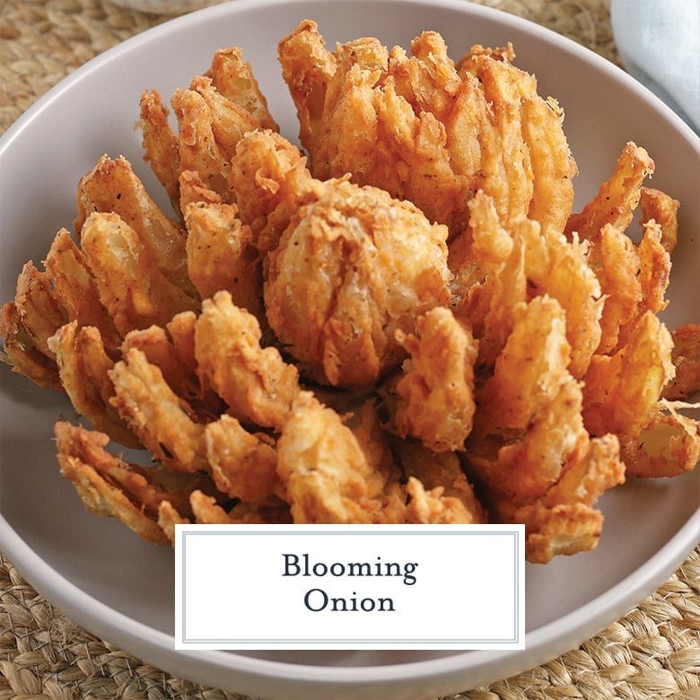 fried blooming onion on a white dish 