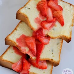 basil pound cake topped with strawberries