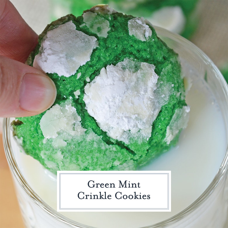 green crinkle cookie dipping into a glass of milk 