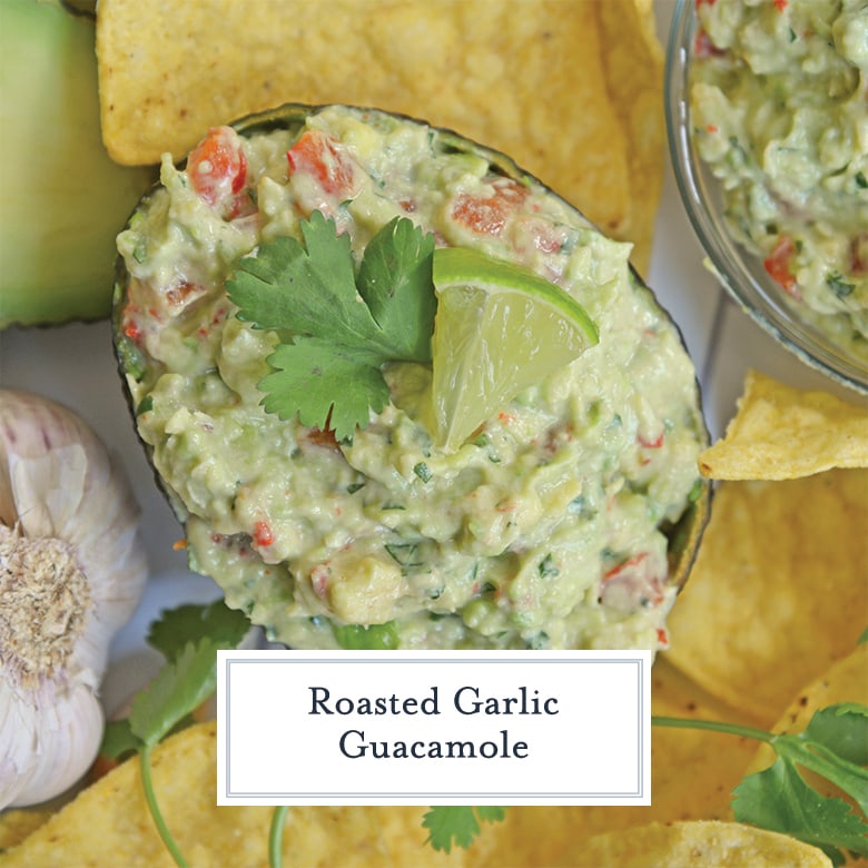 homemade guacamole in an avocado halve with lime and cilantro 