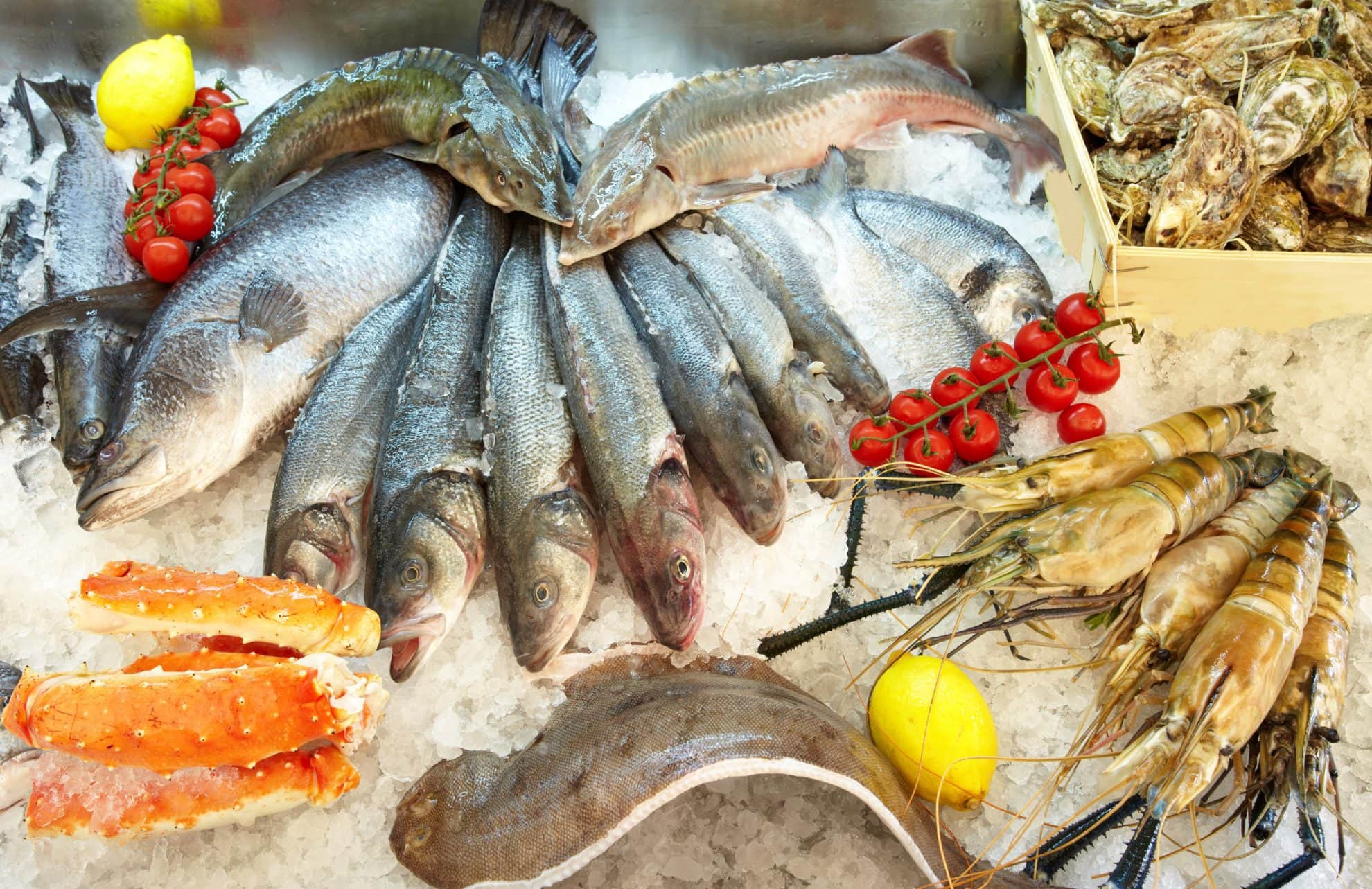 raw seafood at a seafood counter 