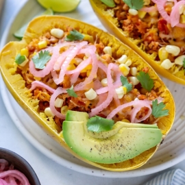 close up of spaghetti squash taco boats