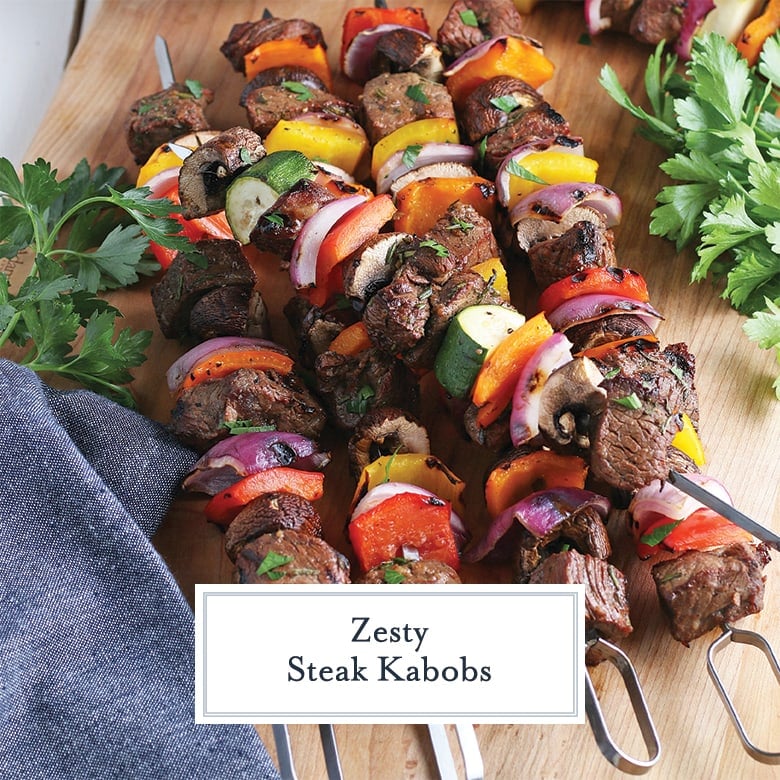 beef kabobs on a wood cutting board