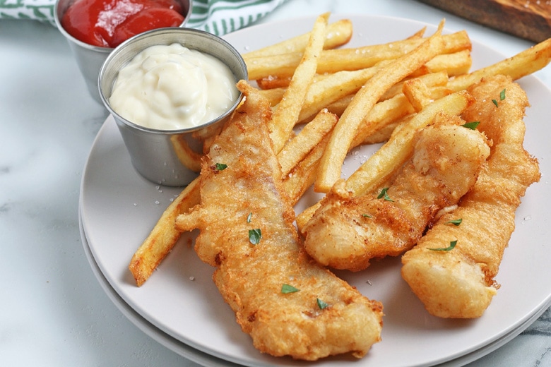 beer battered cod on a plate 