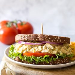 hummus chicken salad sandwich on a plate