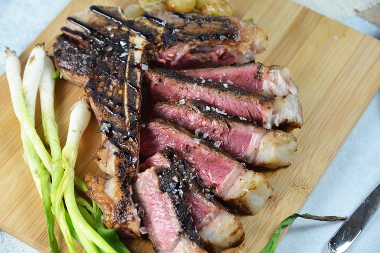 porcini rubbed steak with grilled onions 