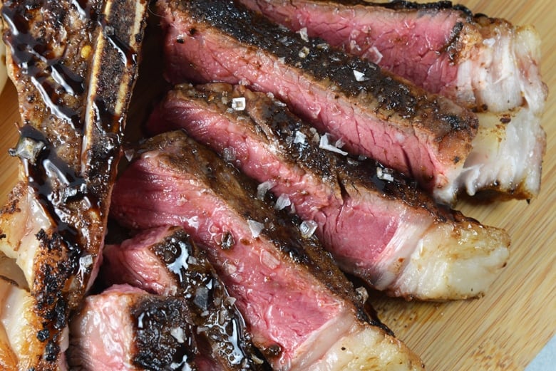 close up of sliced t-bone steak 