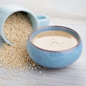 blue bowls of sesame seeds and tahini