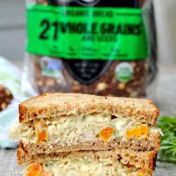 apricot chicken salad sandwich cut in half