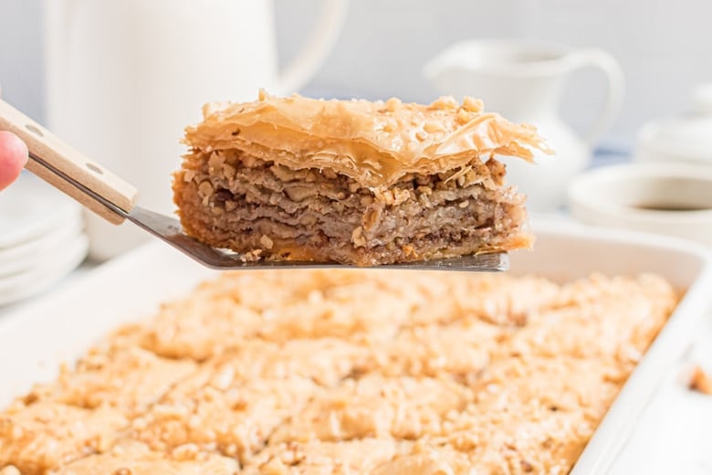 spatula holding slice of baklava 