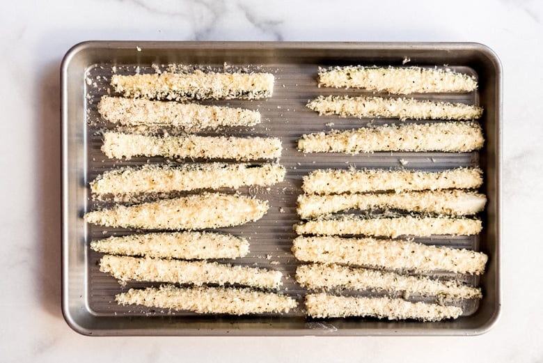zucchini strips on a baking sheet 