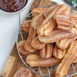 air fryer churros on a serving platter