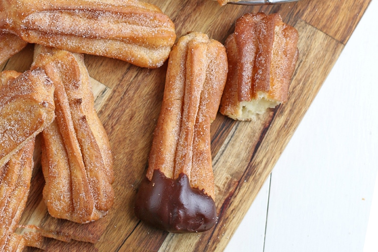 churro dipped in chocolate sauce 