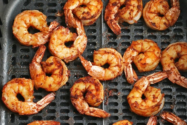 shrimp in an air fryer basket 