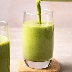 matcha banana smoothie poured into glass