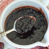 spooning cherry balsamic sauce