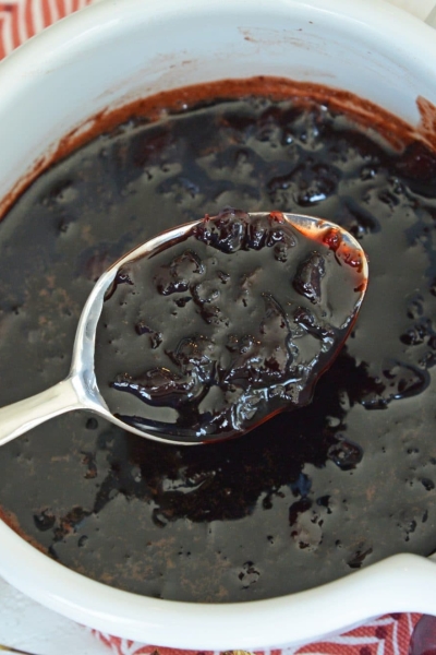 spooning cherry balsamic sauce